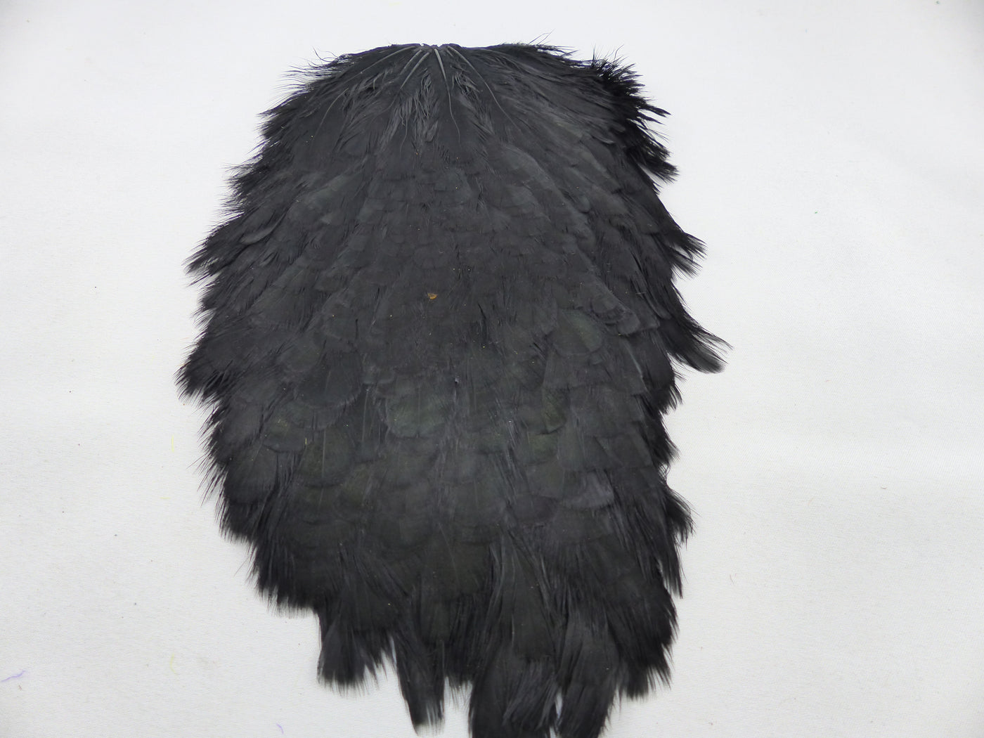 Cape de selle de poule